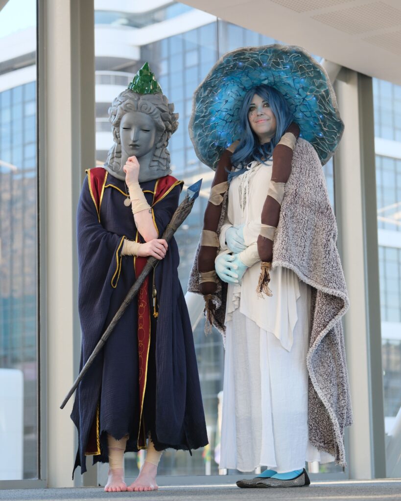 Sellen cosplayer standing next to Ronni cosplayer